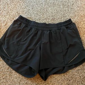 Lululemon 4 in black shorts